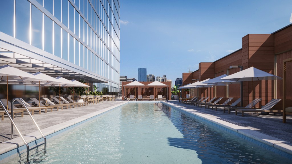 Conrad Nashville - Pool Deck, lounge chairs, city view