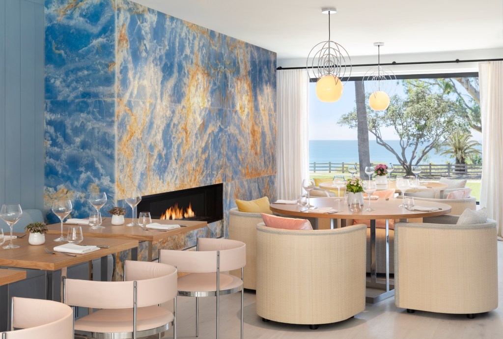 Oceana Santa Monica, LXR Hotels &amp; Resorts - Dining Room View, Ocean view, chairs, tables, wine classes, fireplace