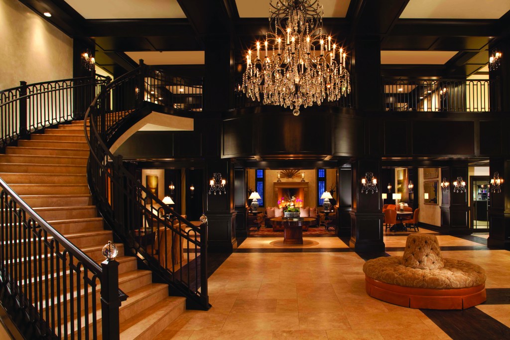 Waldorf Astoria Park City - Lobby, staircase, chandelier, seating areas, sconces