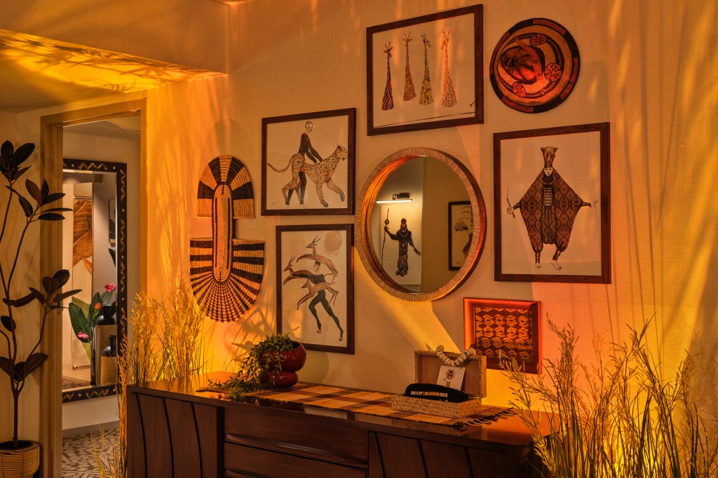 Hilton New York Times Square_THE LION KING's Royal Suite Dresser concept art on walls, mirror plants