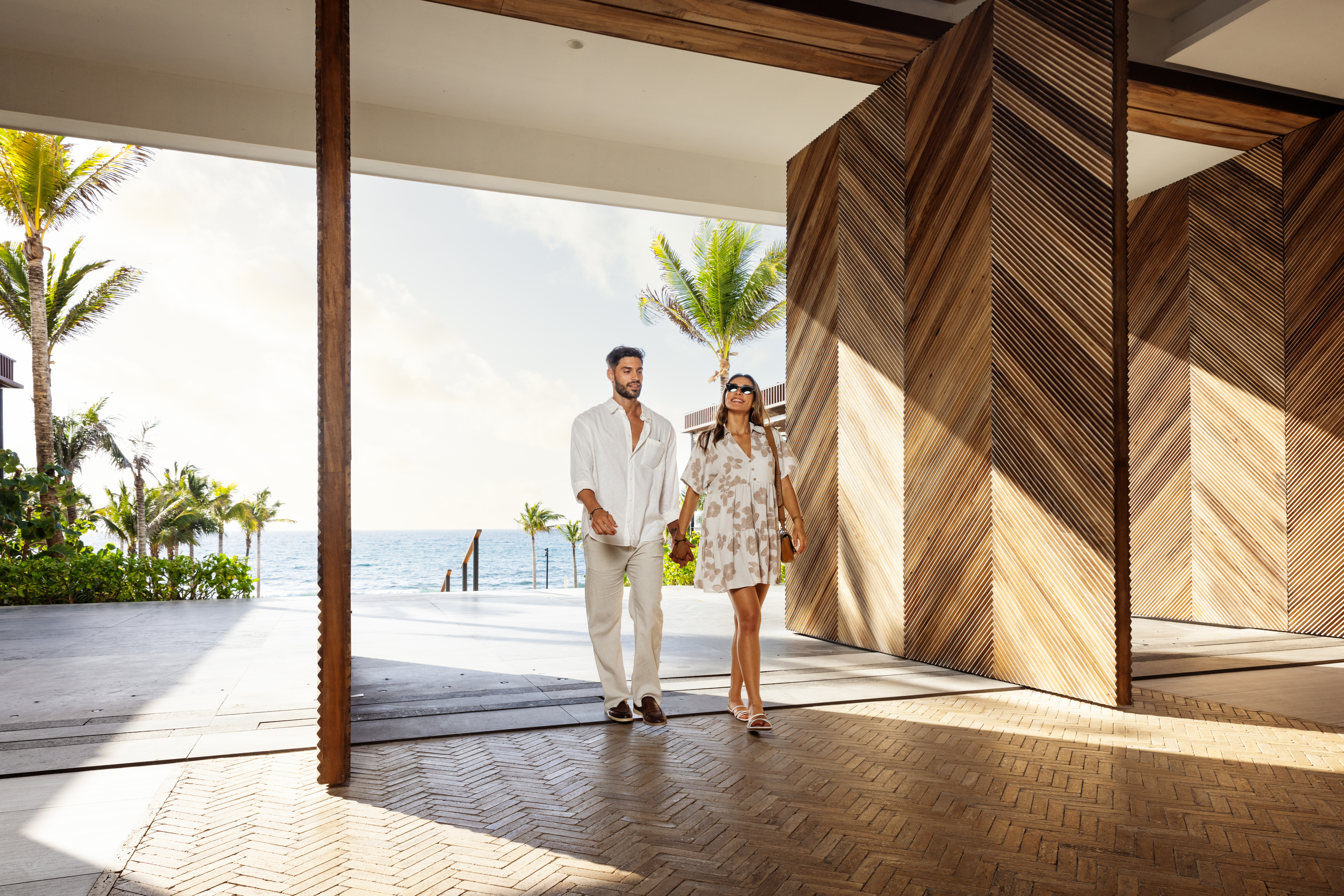 Hilton Tulum Riviera Maya, All-Inclusive Resort, Couple Walking Through Doorway, Coast, Palm Trees