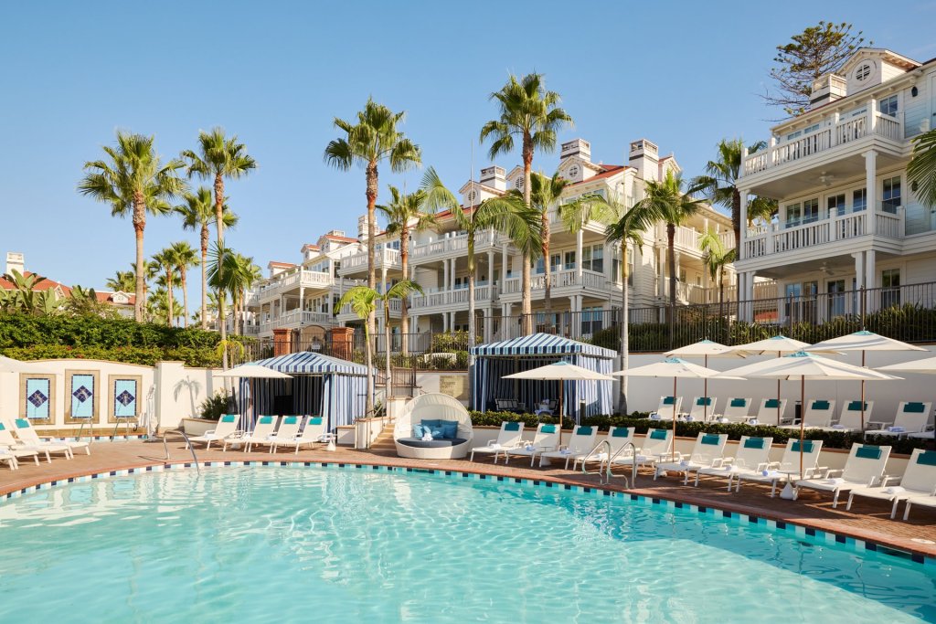 pool, chairs, cabanas, palm trees at Beach Village at The Del, LXR Hotels &amp; Resorts