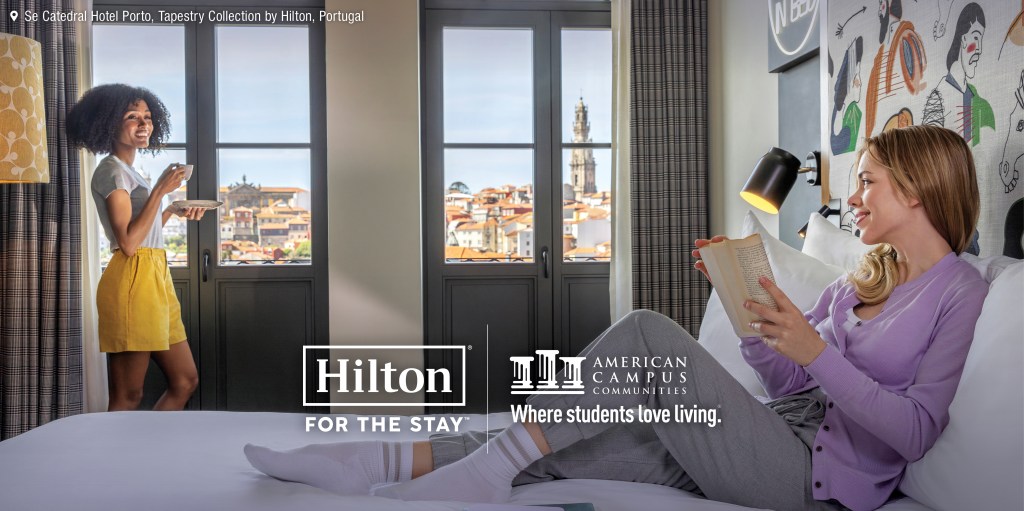 Two women in a hotel room at Se Catedral Hotel Porto, Tapestry Collection by Hilton, Hilton and American Campus Communities Partnership logos