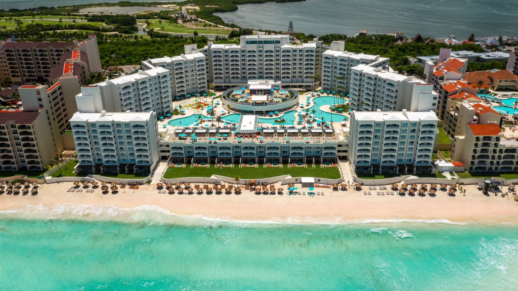 Hilton Cancun Mar Caribe All-Inclusive Resort, Exterior, beach, ocean, pools, lounge chairs, umbrellas, waves, plunge pools