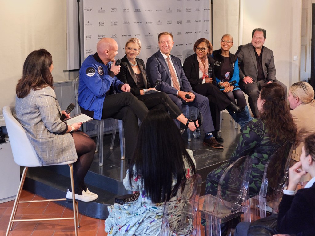 (L-R) Alexander Gerst - ESA Astronaut &amp; Geophysicist; Emma Banks, vice president, F&amp;B Strategy &amp; Development, EMEA, Hilton; Tim Kopra, CEO, Starlab; ): Vanessa Wyche, director, NASA’s Johnson Space Center; Dr. Sian Proctor - Astronaut, Geoscientist &amp; Space Artist; and Larry Traxler, senior vice president, Global Design Services, Hilton at the 75th International Aeronautical Congress in Milan, Italy. International Aeronautical Congress panel in Milan, Italy