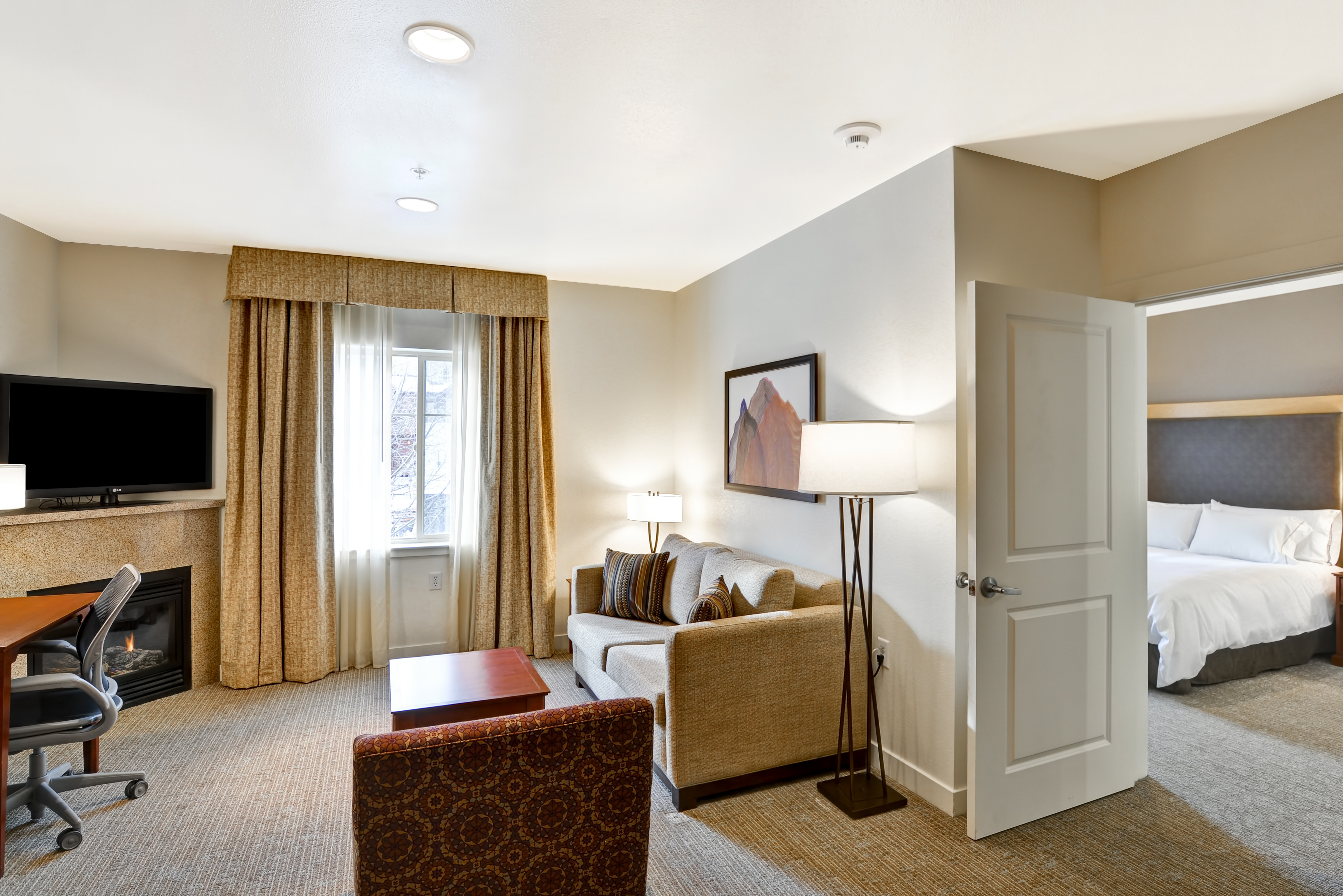 Homewood Suites by Hilton Jackson - Accessible Guest Room, Accessible King, desk chair, couch, fireplace, lamp, television