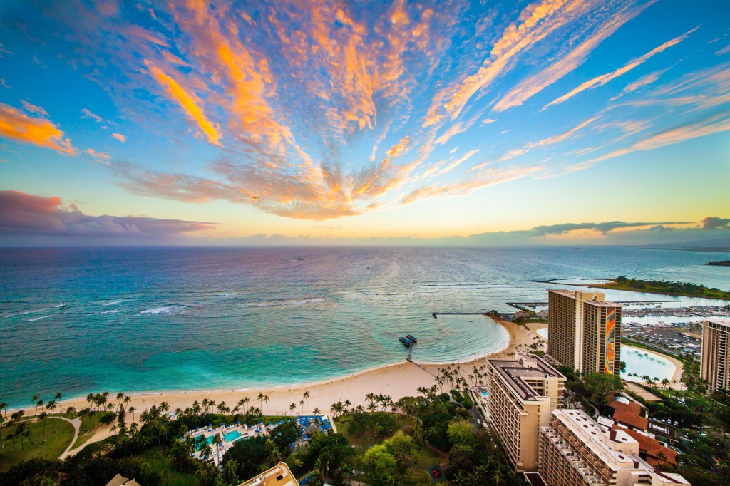 Hilton Hawaiian Village Waikiki Beach Resort - Aerial Sunset, ocean view aerial of resort