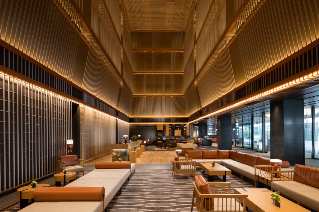 Hilton Kyoto lobby area with seating and front desk