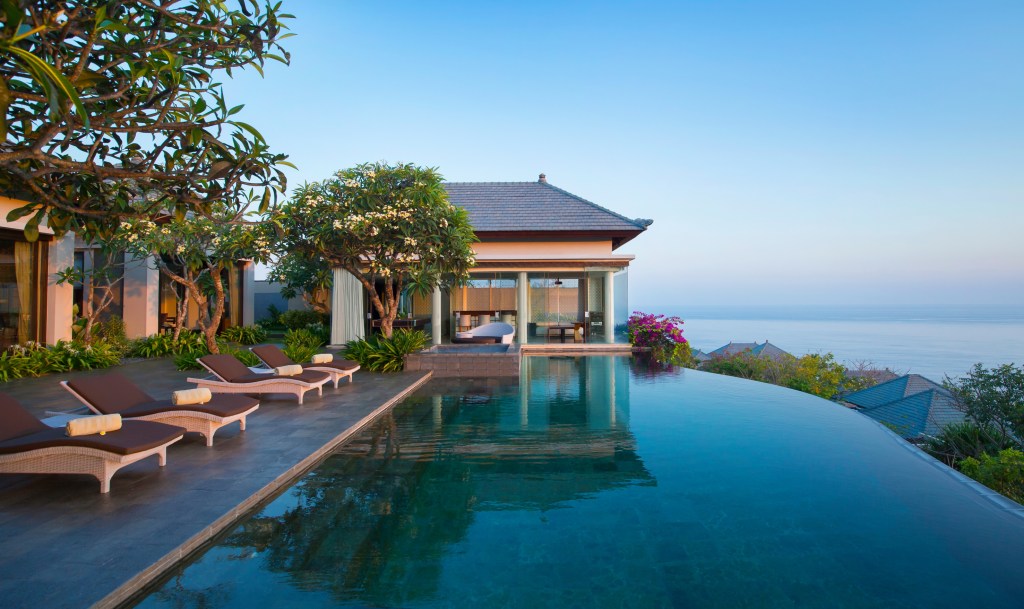 Umana Bali, LXR Hotels & Resorts, Villa, infinity pool view with lounge seating and garden