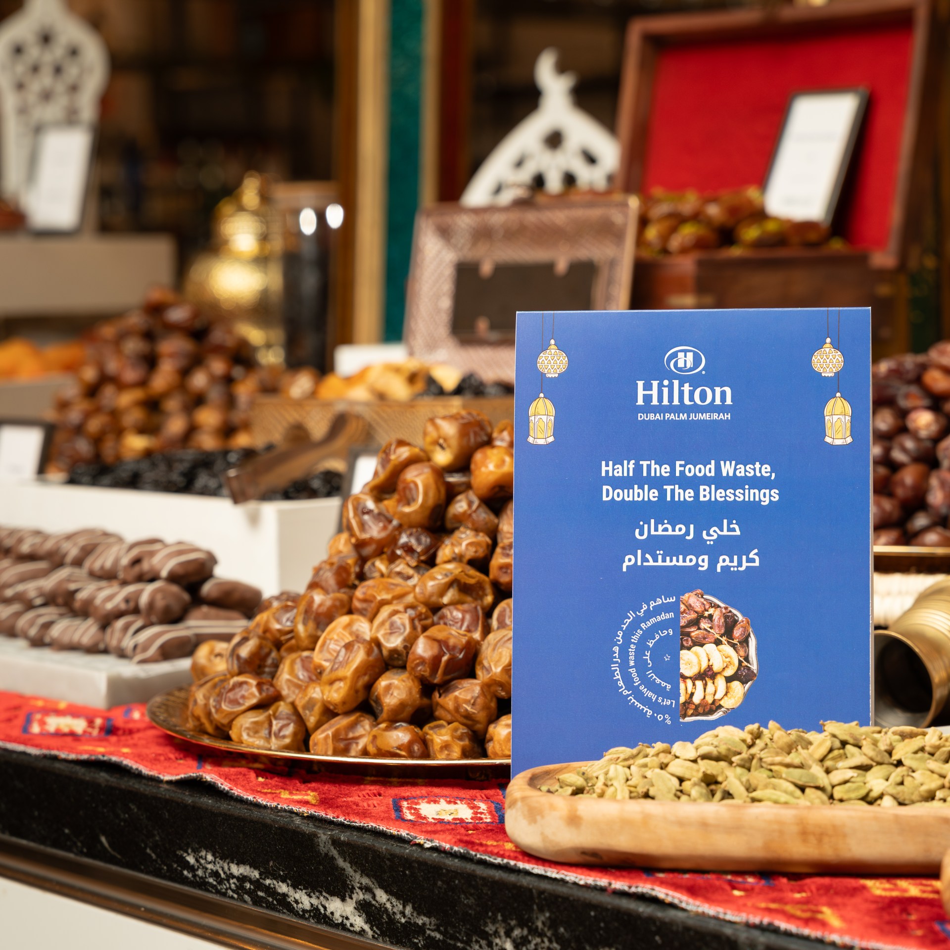 Dessert buffet with Hilton Green Ramadan 2025 signage
