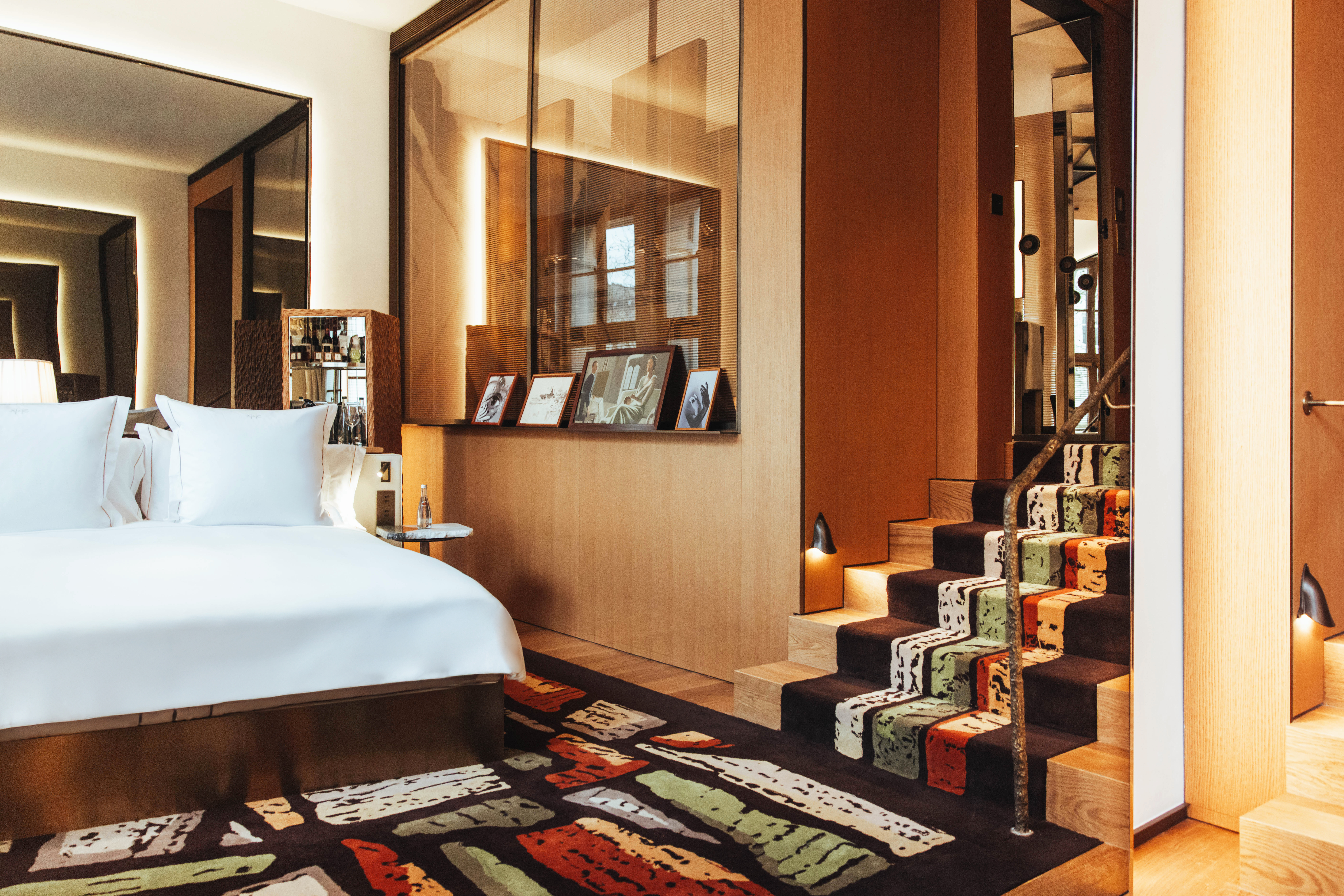 Sax Paris, LXR Hotels & Resorts - Deluxe Junior Suite, bed and stair way up to other par of suite