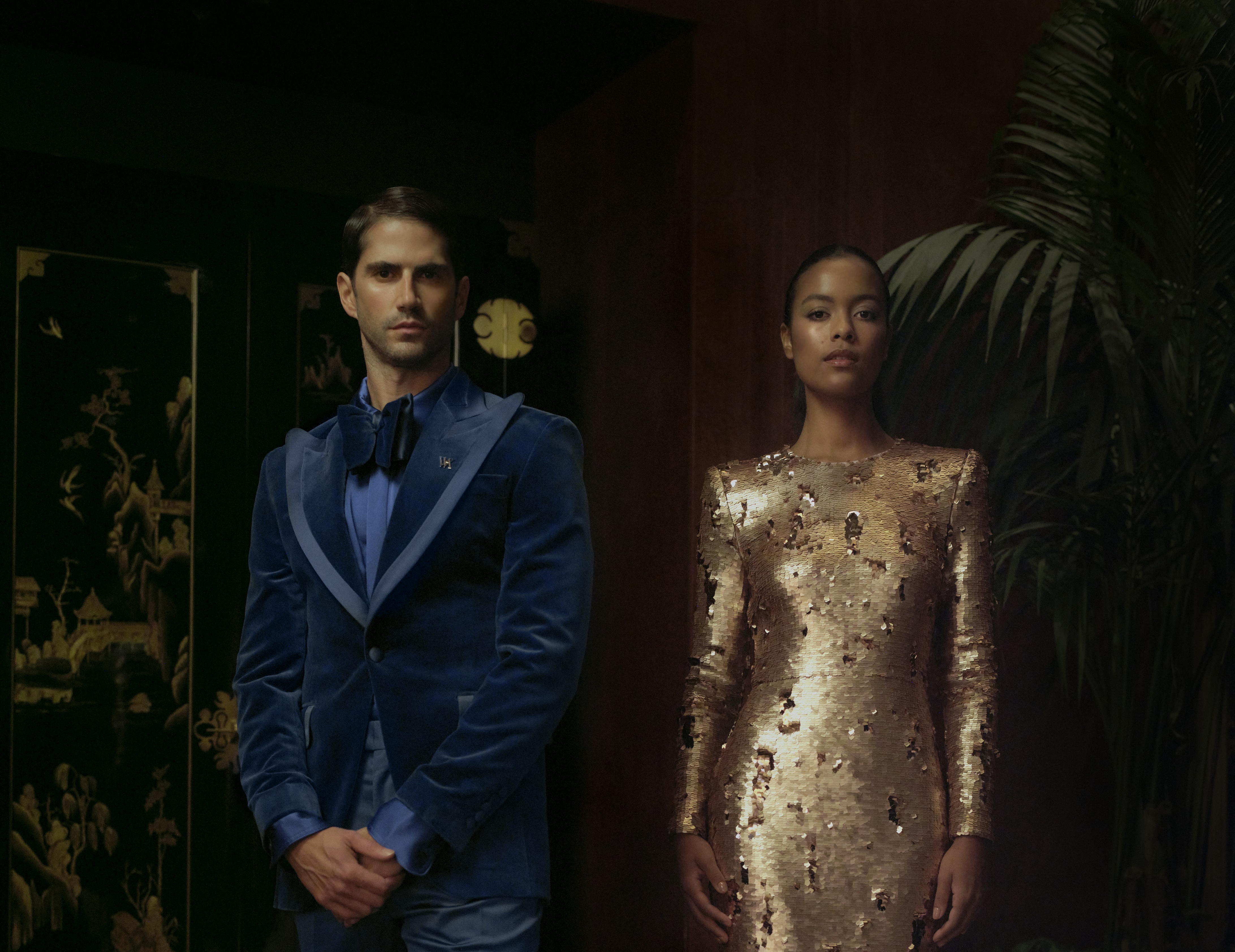 Two Waldorf Astoria New York Peacock Alley Server team members in Uniform