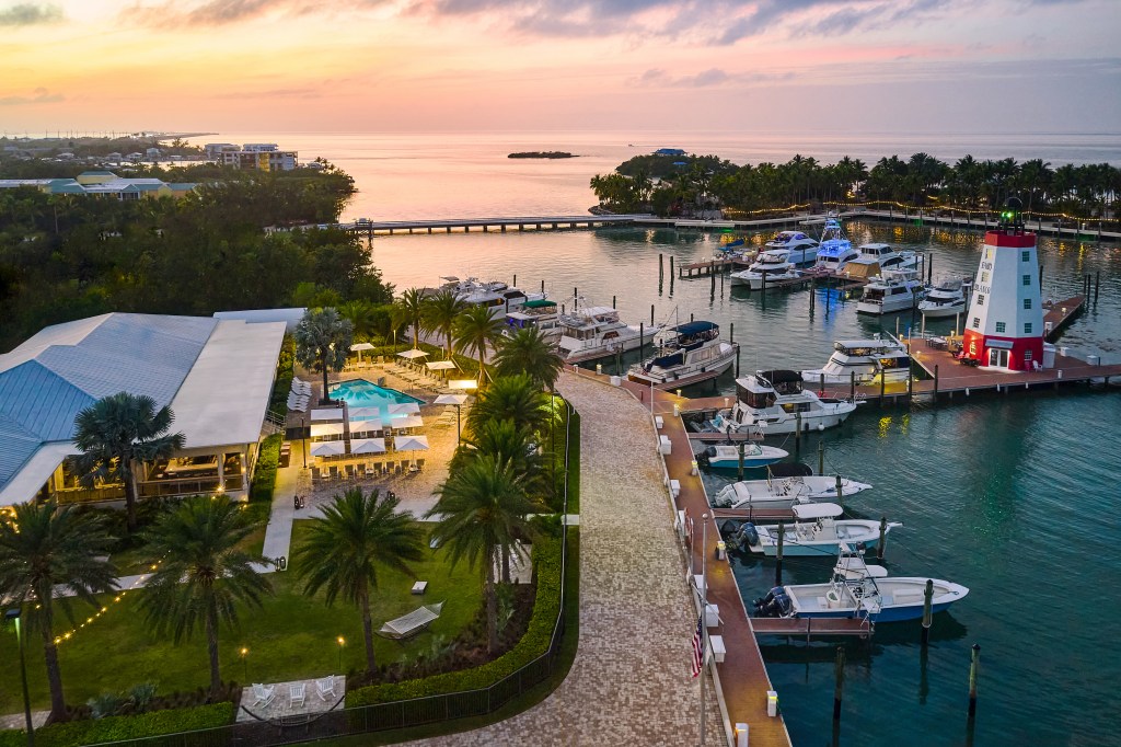 Faro Blanco Resort & Yacht Club Marathon, Curio Collection by Hilton - aerial view of hotel exterior and ocean with boats