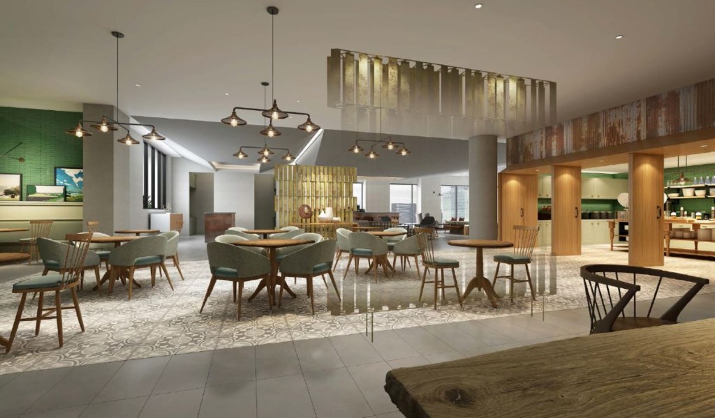 Homewood Suites by Hilton Nashville Downtown The Gulch dining area with wooden round tables and dining chairs, framed artwork, open buffet self serving food bar, pendant ceiling lighting, tiled floor