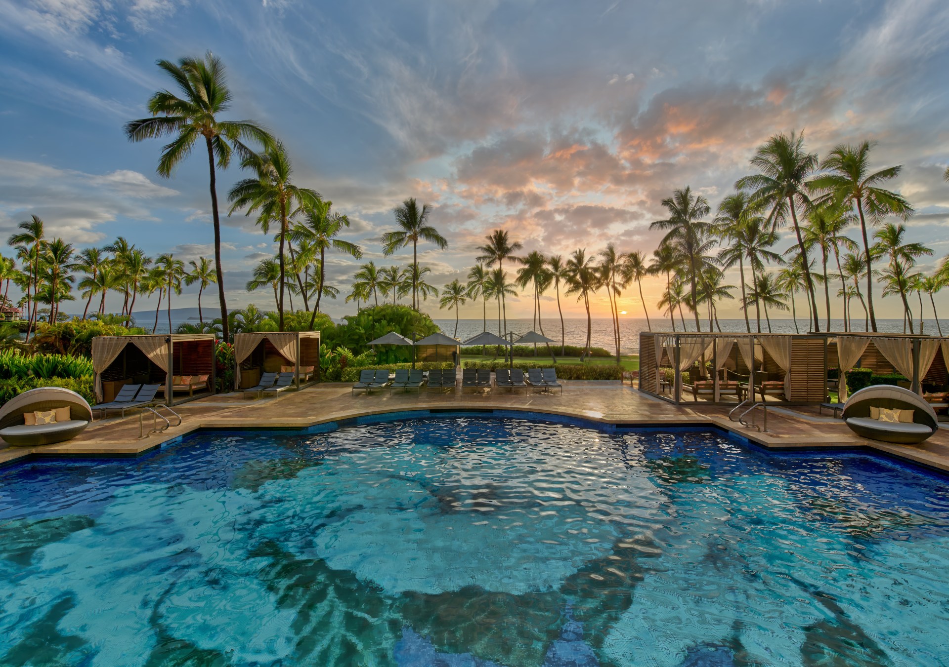 Grand Wailea, A Waldorf Astoria Resort Hibiscus Serenity Pool, pool, palm trees, cabanas, ocean view, pool daybeds, chaise lounge pool chairs with umbrellas