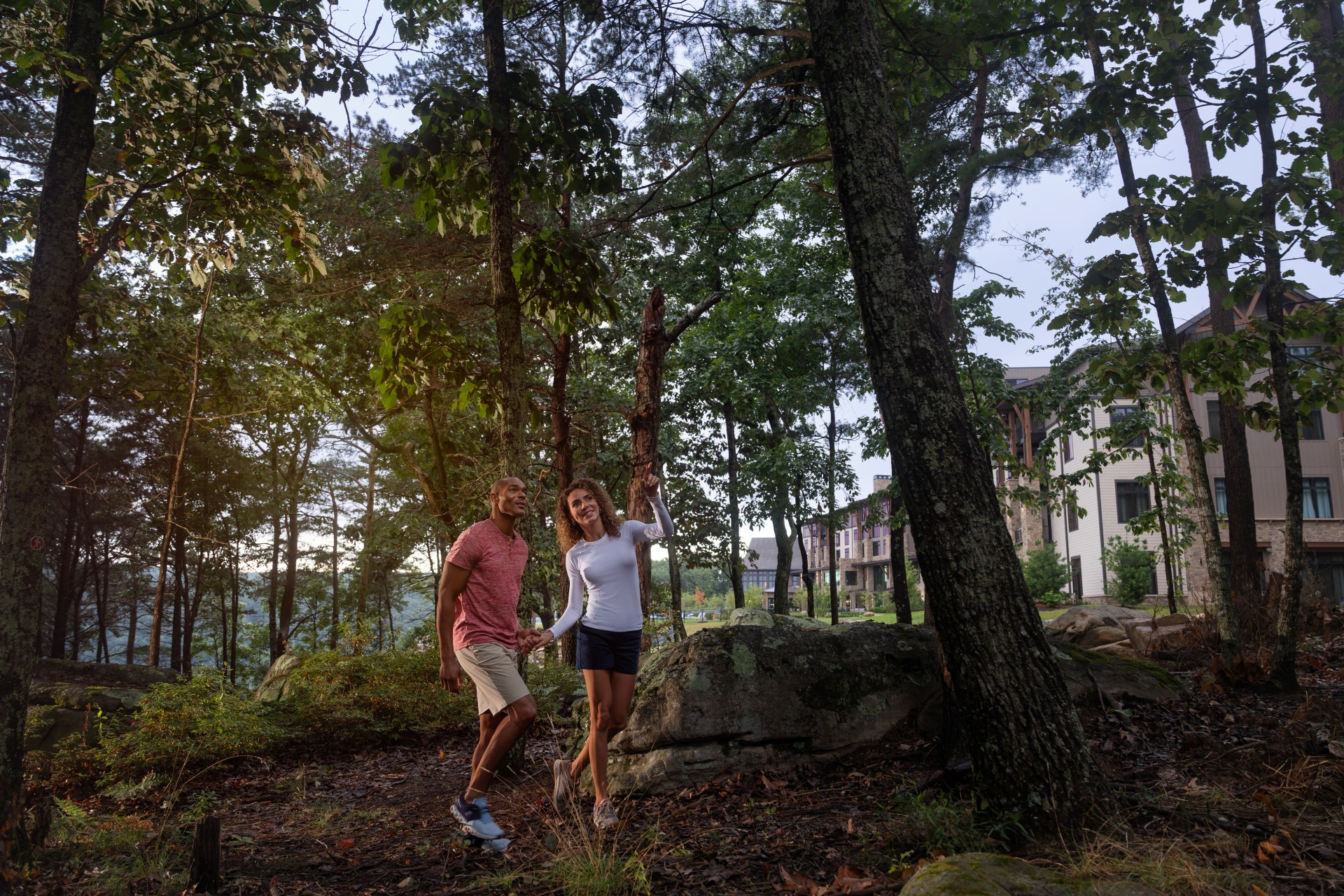 Cloudland at McLemore Resort Lookout Mountain, Curio Collection by Hilton, couple hiking in woods next to hotel