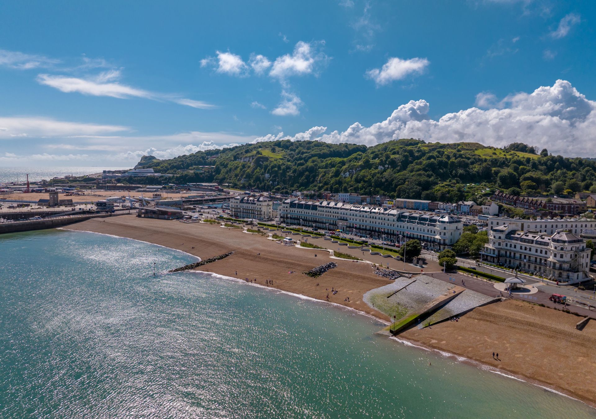 An aerial shot of the hotel and the water