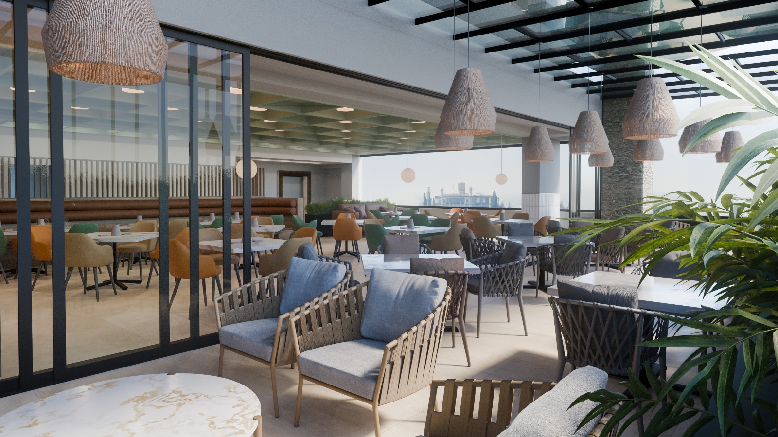 An indoor/outdoor space, with many tables and chairs, and a sliding glass wall that can be retracted.