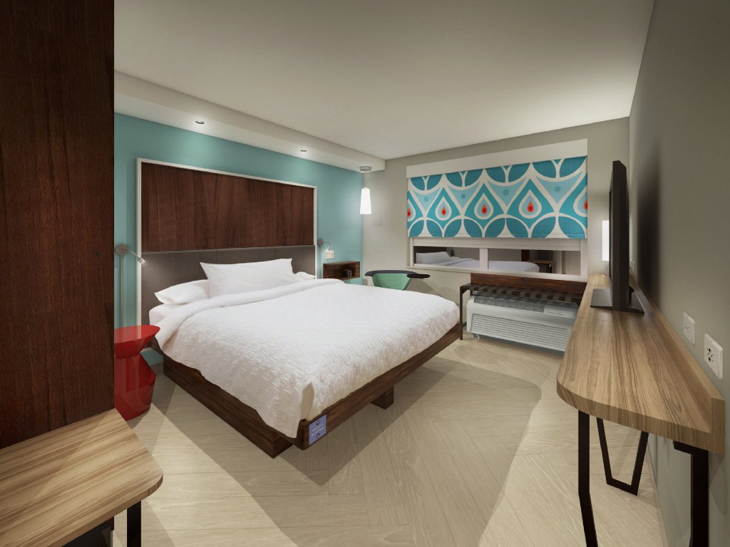 rendering of guest room with king bed, white bedding, dark wood accent walls and colorful blue curtain at Spark by Hilton Toronto Airport