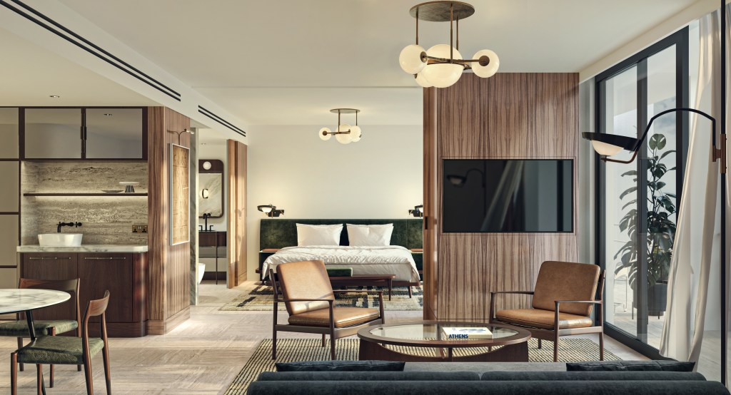 A room with bed, seating area, dining table