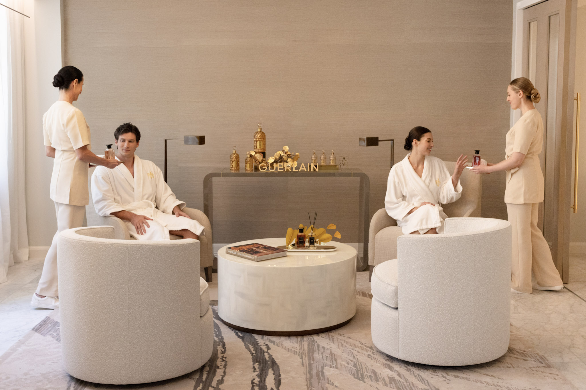 Guests relaxing in the Guerlain Spa lounge at the Waldorf Astoria New York.