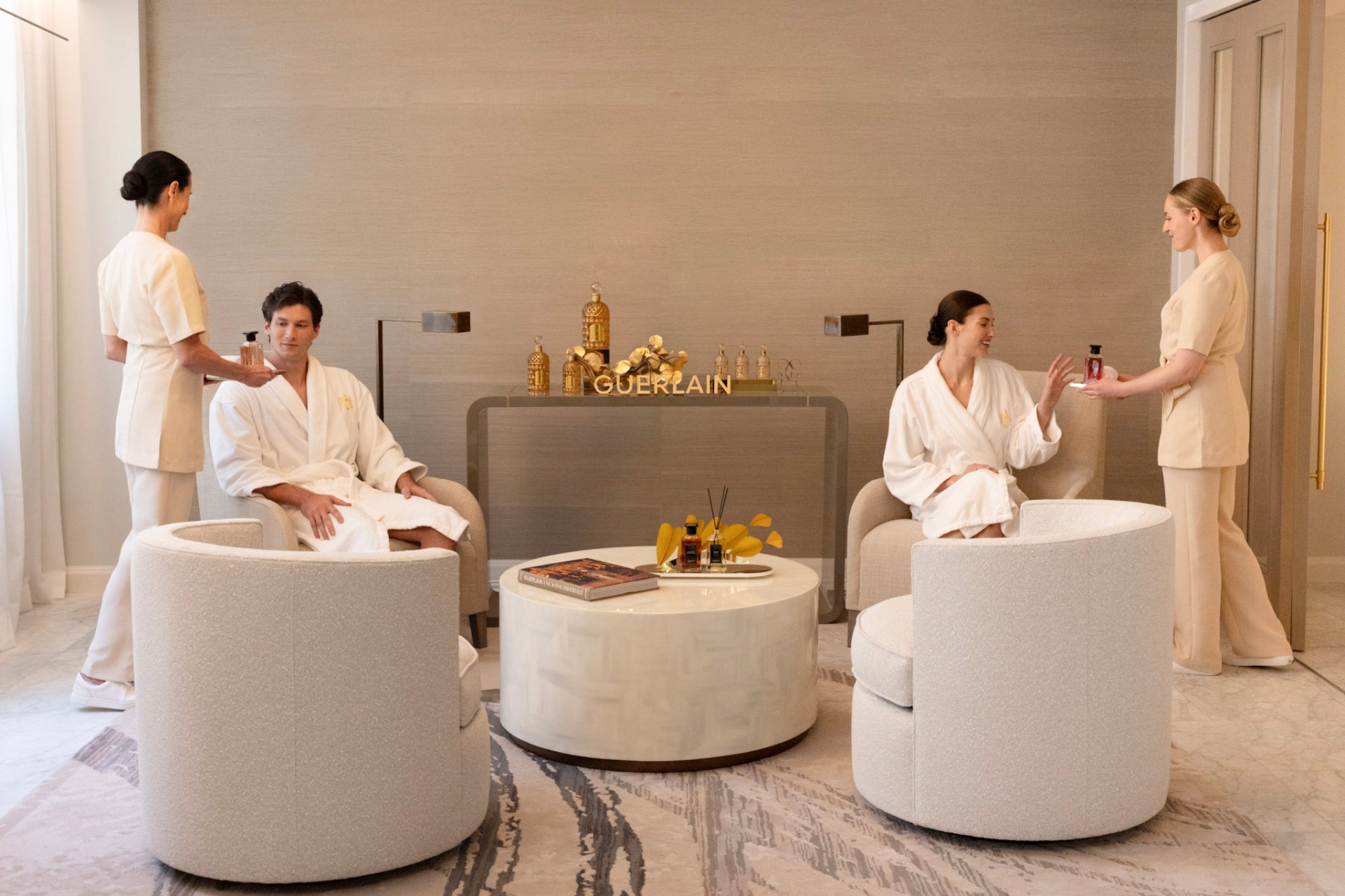 Guests relaxing in the Guerlain Spa lounge at the Waldorf Astoria New York.