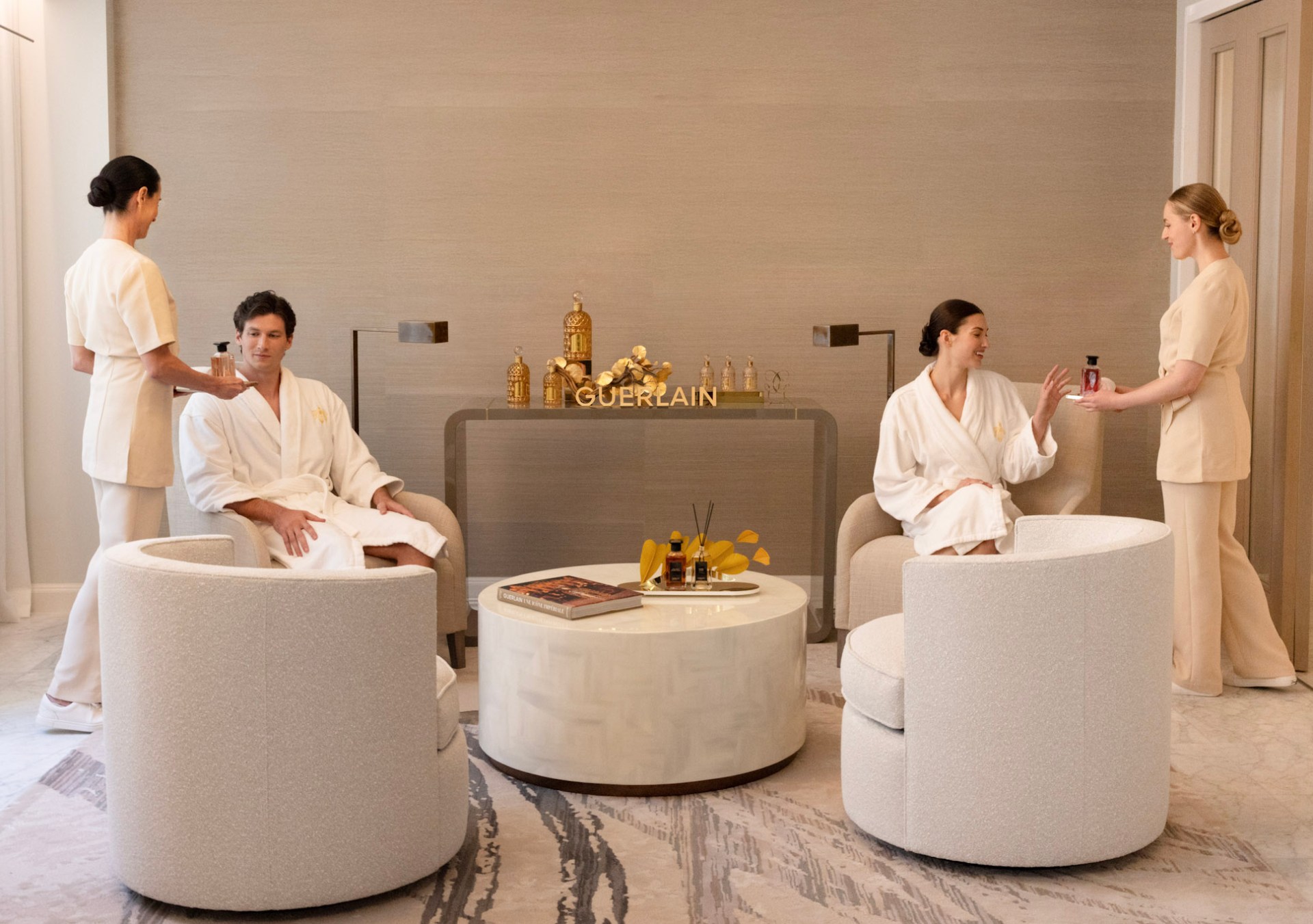 Guests relaxing in the Guerlain Spa lounge at the Waldorf Astoria New York.