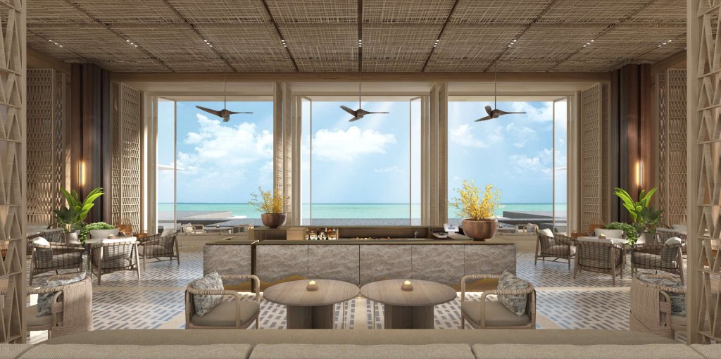 Seating in the lobby of the Hilton Burau Bay Resort Langkawi overlooking the water