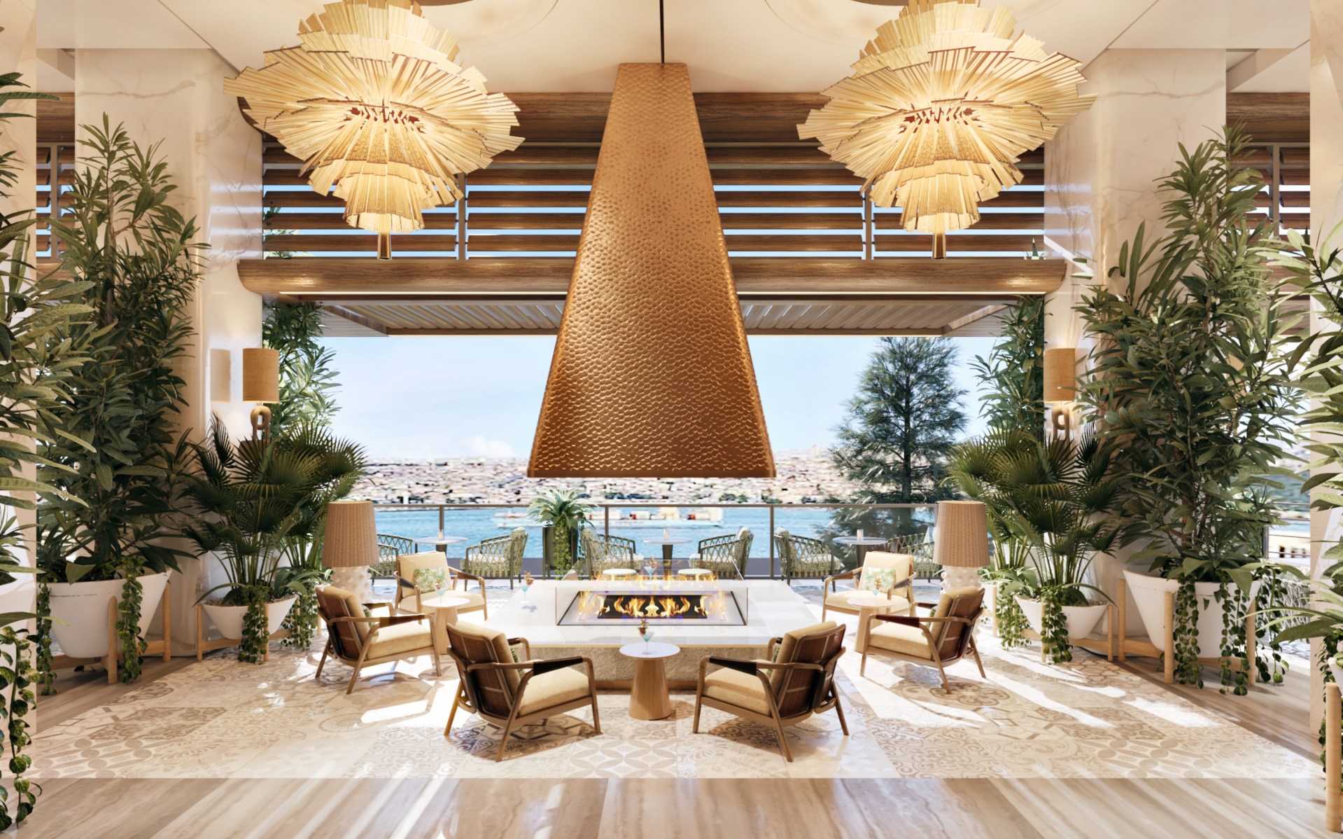 Chairs surrounding a large fire pit overlooking the water.