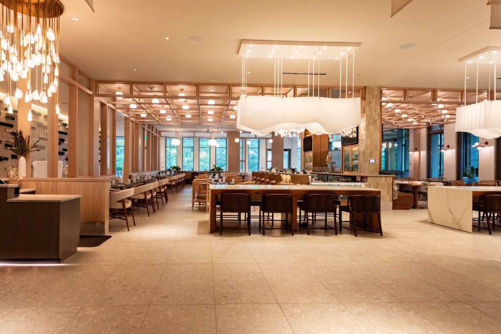 A dining room with many tables