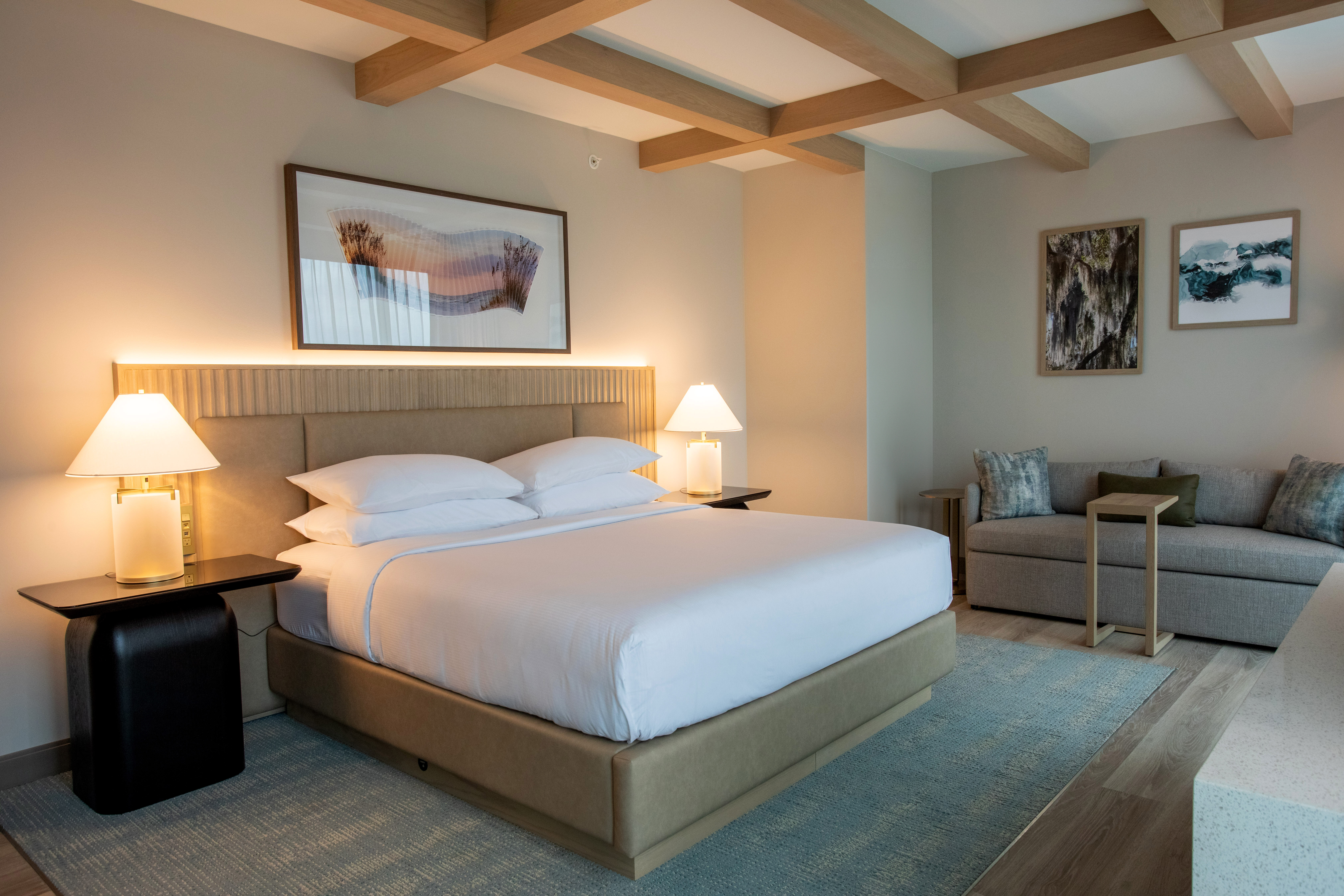 A room with bed and couch