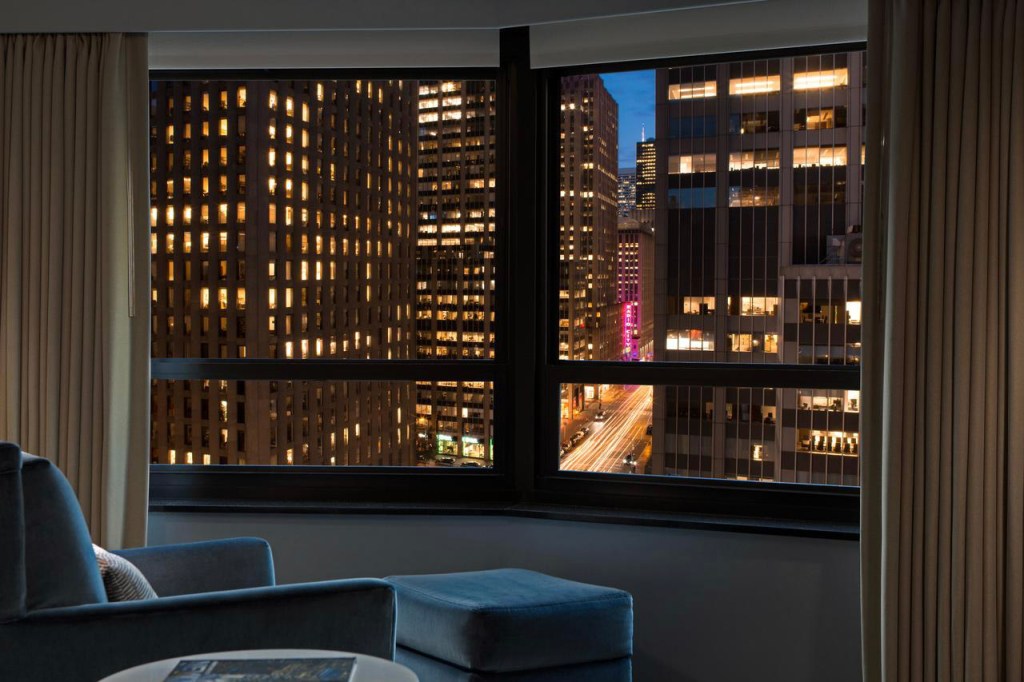 Guest room with city view at New York Hilton Midtown
