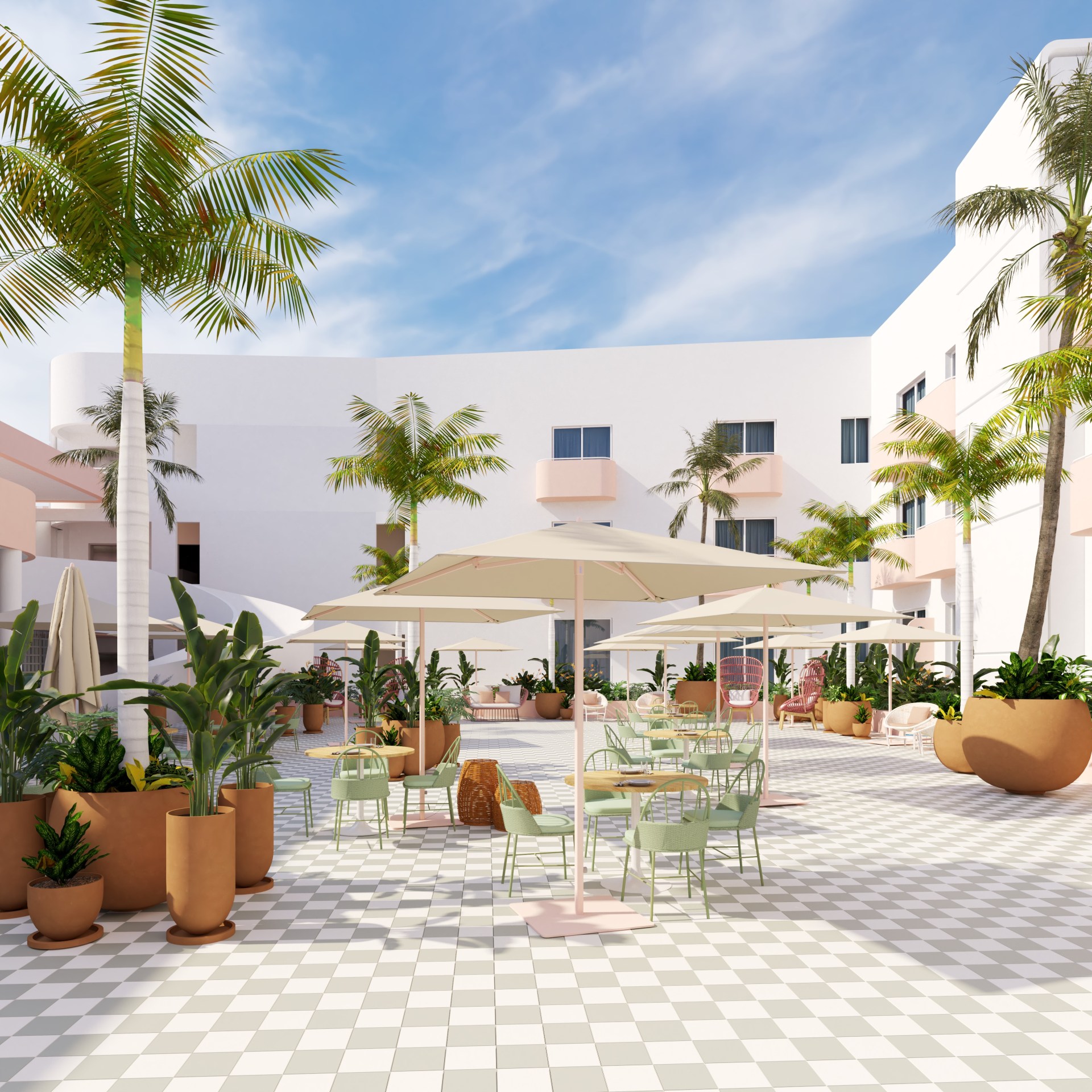 A courtyard surrounded by the hotel with tables and chairs under umbrellas