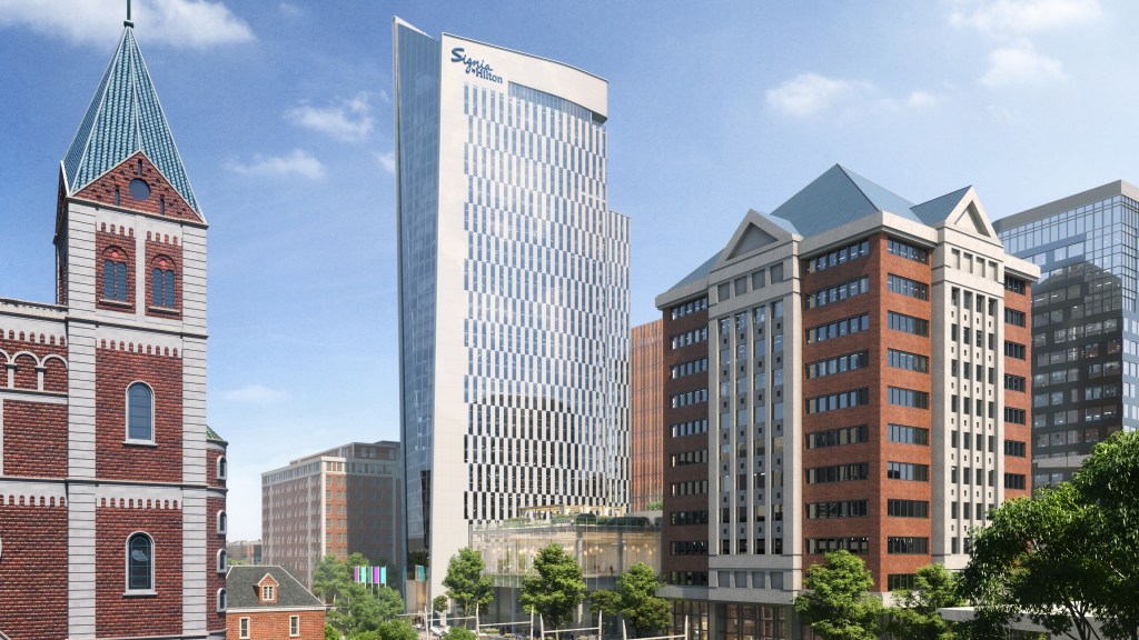 City buildings featuring the Signia by Hilton Indianapolis in the center