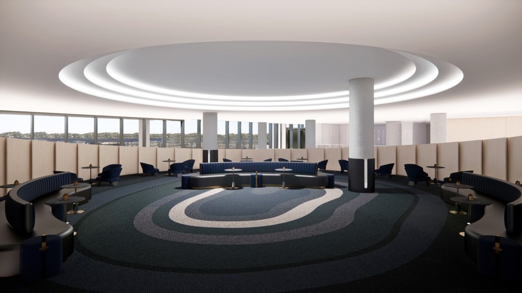 a large gathering room, with seating around the edges and space in the middle