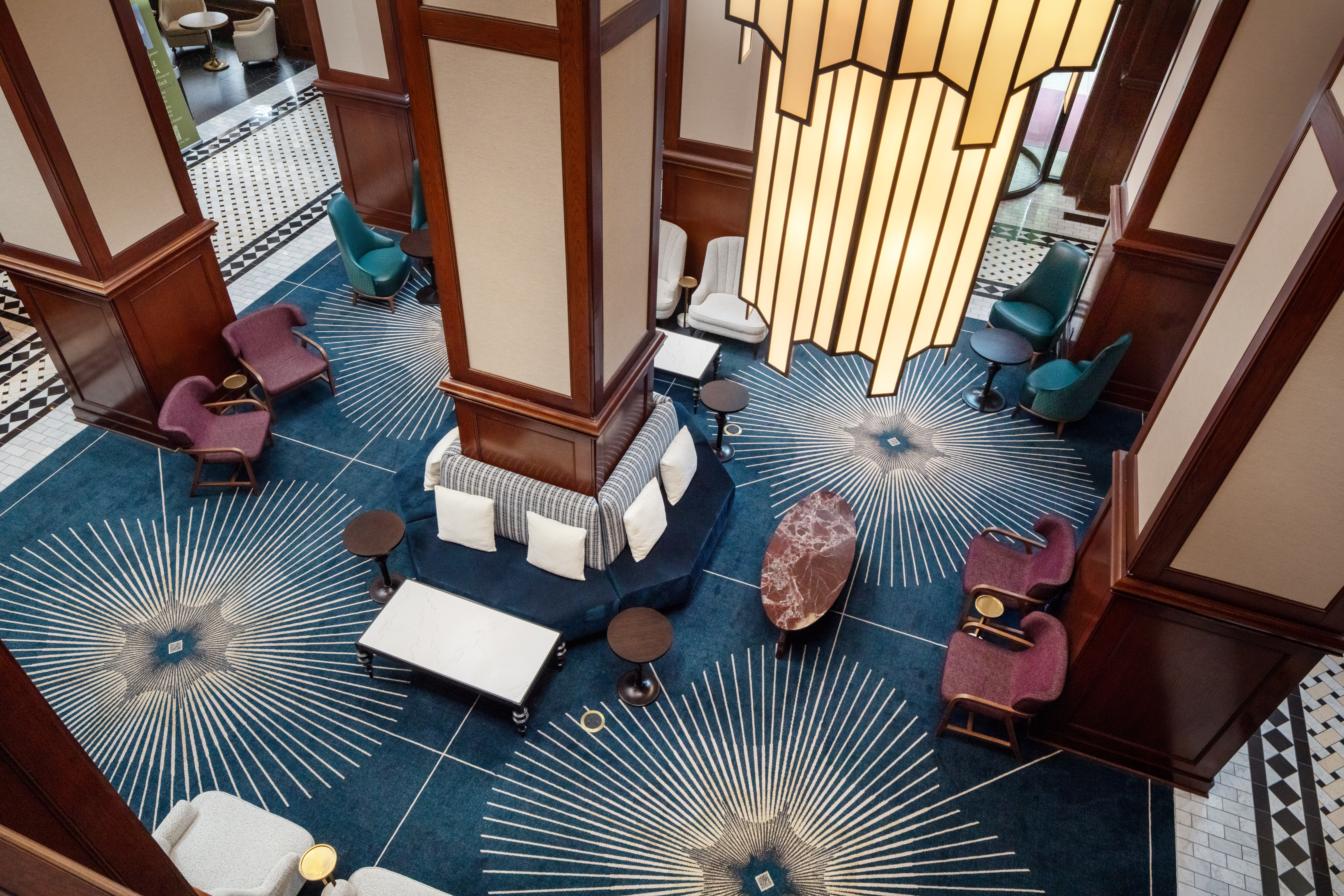 an overhead shot of the various seating areas between the columns of the lobby