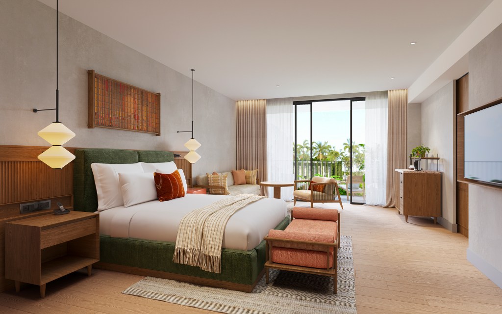 Room at NHAAN Resort & Spa Hoi An with bed, bench, tv, and balcony