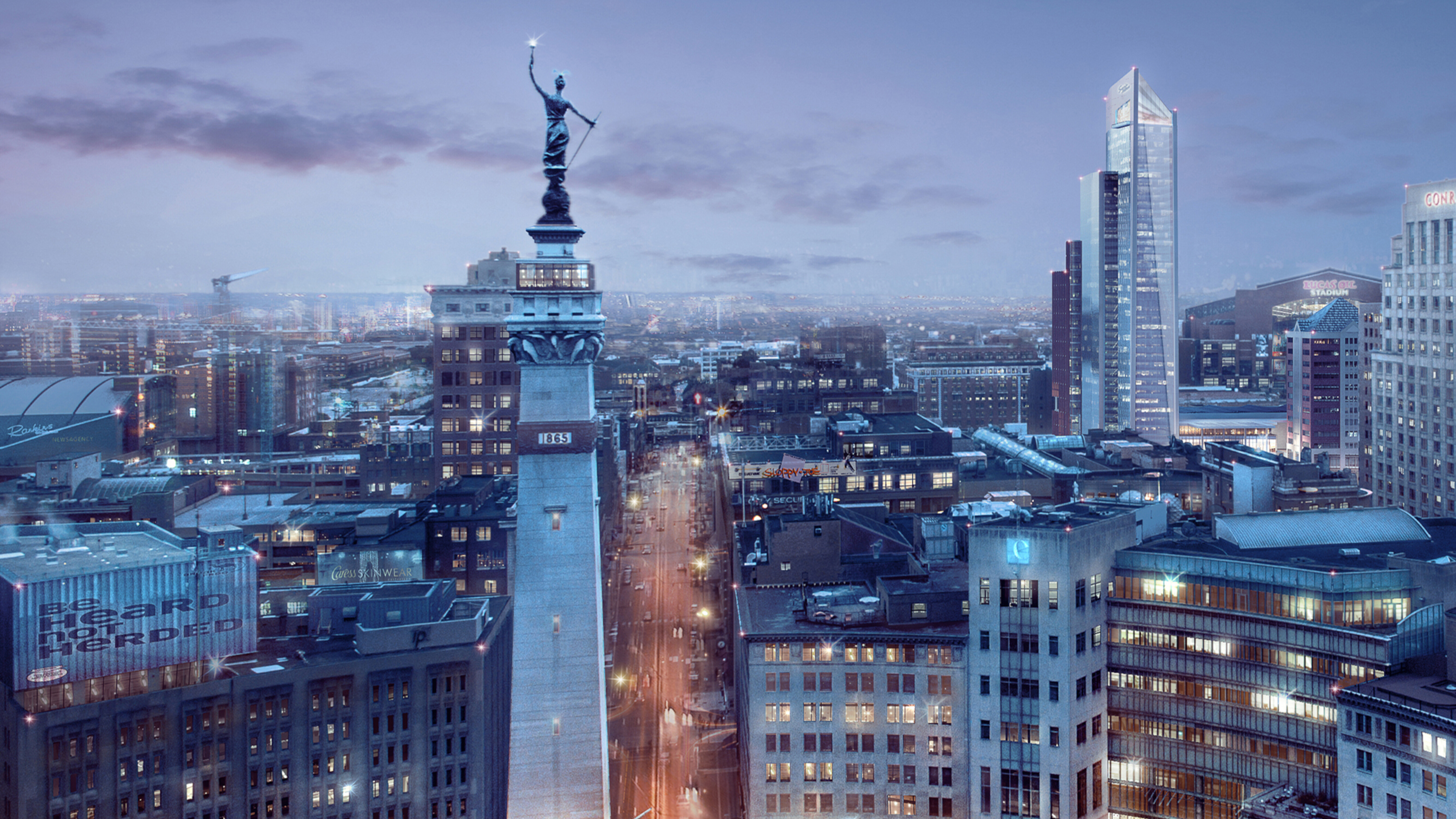 City skyline at dusk featuring a tall monument with a statue on top and illuminated modern skyscrapers in the background.