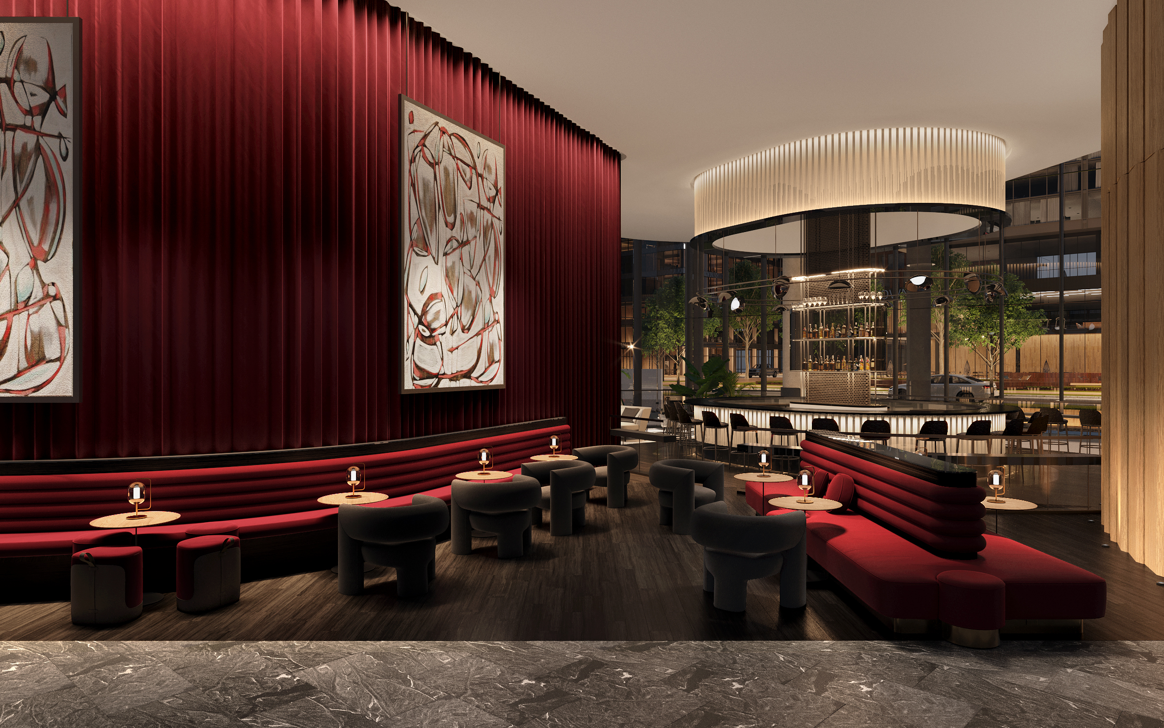 Modern lounge area at the Signia Hilton Indianapolis with red velvet seating, small round tables with lamps, abstract wall art, and a circular illuminated bar in the background.
