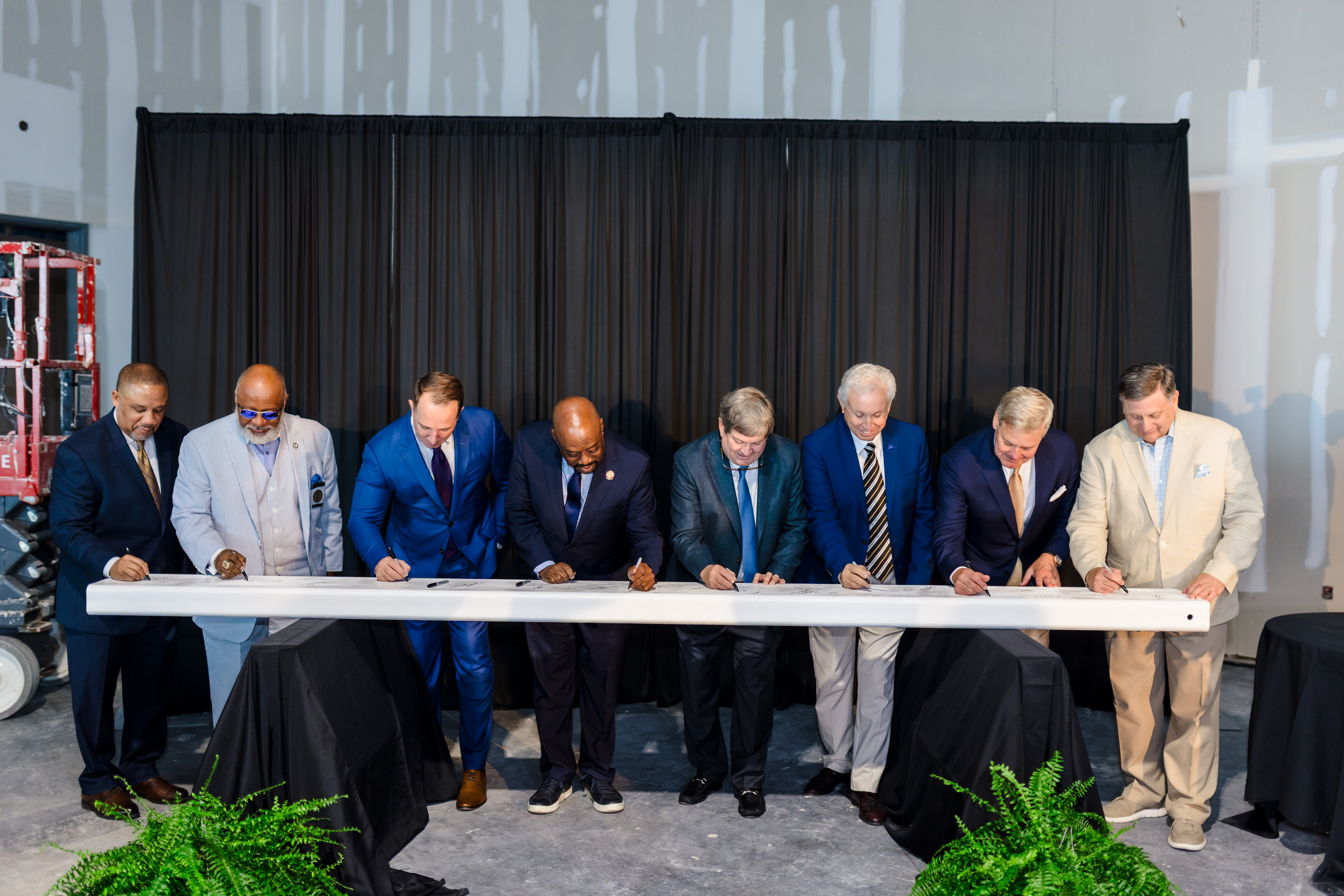 Signia Hotel Topping Out Ceremony - Left to right: Kelvin Moore, General Manager and Senior Vice President, Savannah Convention Center; Chester A. Ellis, Chairman, Chatham County Commission; John Parkinson, Area Vice President, Operations, Hilton; Mayor Van R. Johnson II, City of Savannah; Mark Smith, Board Chairman, Savannah-Georgia Convention Center Authority; Rep. Ron Stephens, 164th District, Georgia House of Representatives; David Songy, Chairman, CEO and Co-Founder, Songy Highroads; Joseph Marinelli, President & CEO, Visit Savannah